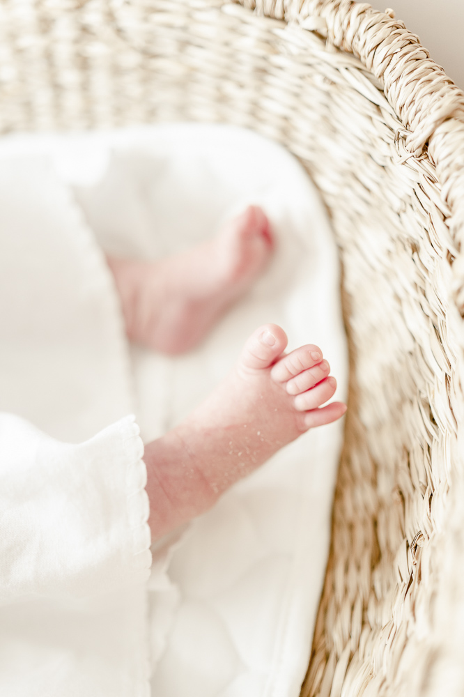 Tiny newborn toes with peeling skin by newborn photographer Kristie Lloyd