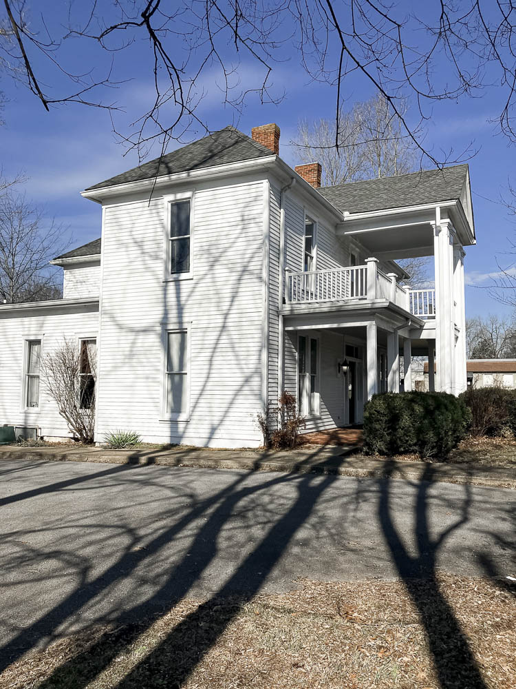White civil war era house in downtown franklin tennessee houses Kristie Lloyd's newborn photography studio Nashville