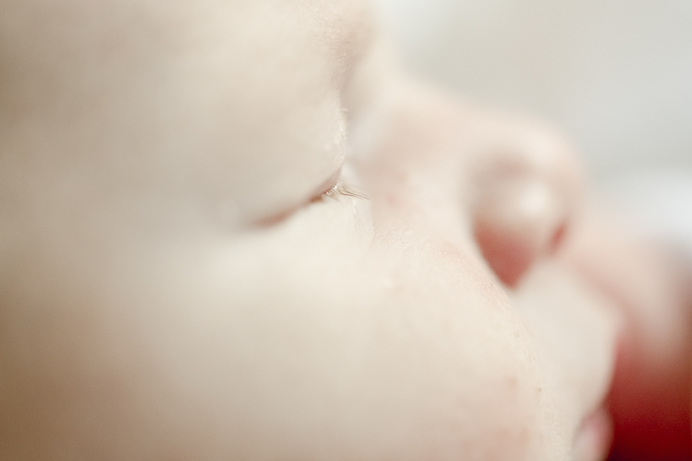 Newborn eyelashes and his nose profile