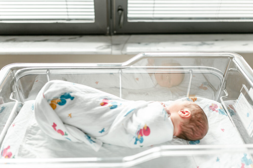 A newborn sleeps in his hospital crib at Williamson Medical Center in Franklin, TN